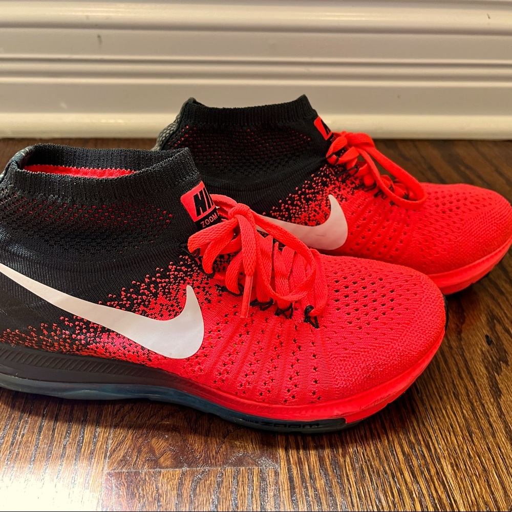 Women Nike Flyknit black and orange